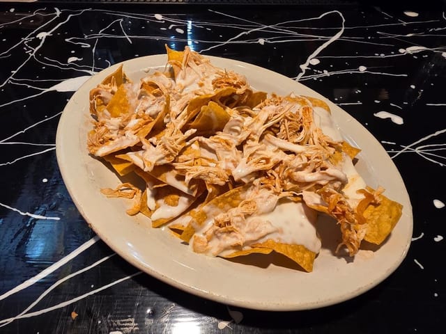 Shredded chicken nachos.